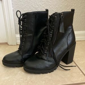 Soda. Black, zip-up heel combat boots.